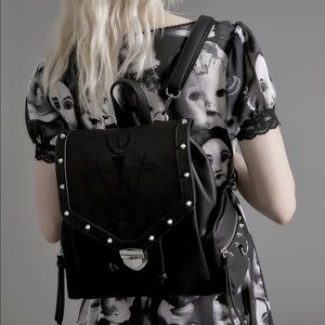 EMBLEM OF FATE STUDDED BACKPACK